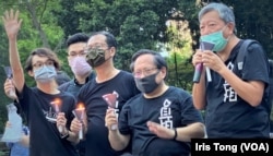 已经解散的香港支联会前正副主席李卓人(右一)、何俊仁(右二)，被控国安法“煽动颠覆国家政权罪” (美国之音/汤惠芸)