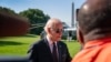 President Joe Biden speaks to members of the media on the South Lawn of the White House in Washington, May 30, 2022, after returning from Wilmington, Del. 