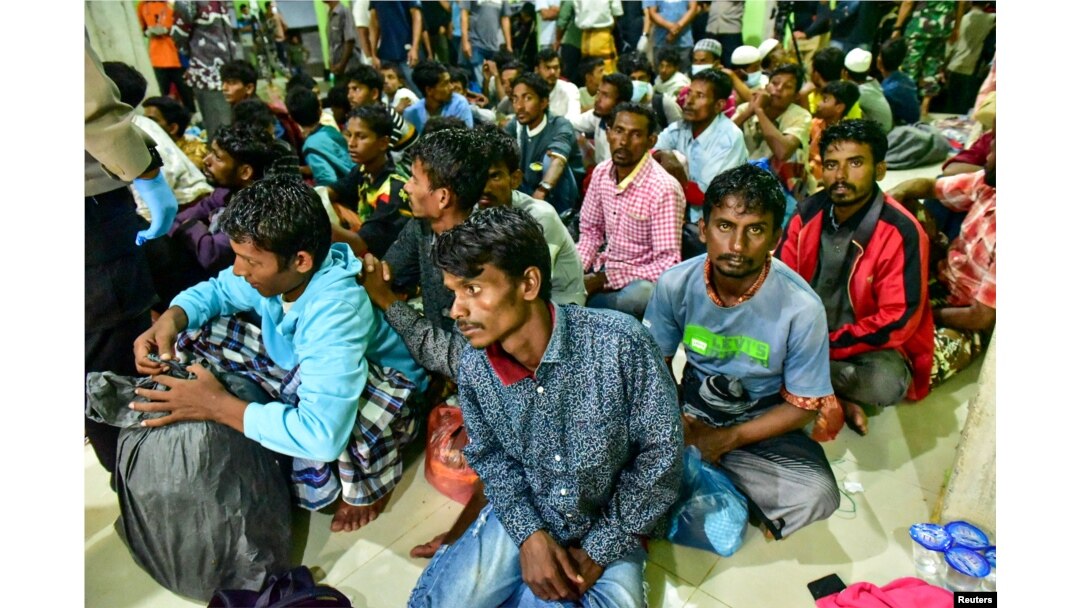 Rohingya refugees wait at a temporary shelter in Pidie, Aceh province, Indonesia, December 26, 2022, in this photo taken by Antara Foto. (Antara Foto/Joni Saputra/via REUTERS)