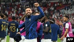 France's forward #09 Olivier Giroud greets the supporters after the Qatar 2022 World Cup round of 16 football match between France and Poland at the Al-Thumama Stadium in Doha, Dec. 4, 2022.