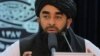 FILE - Taliban spokesman Zabihullah Mujahid speaks during a press conference in Kabul, Nov. 5, 2022.