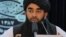 FILE - Taliban spokesman Zabihullah Mujahid speaks during a press conference in Kabul, Nov. 5, 2022.