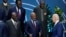 U.S. President Joe Biden talks with African leaders before they pose for a family photo during the U.S.-Africa Leaders Summit at the Walter E. Washington Convention Center in Washington, Dec. 15, 2022.