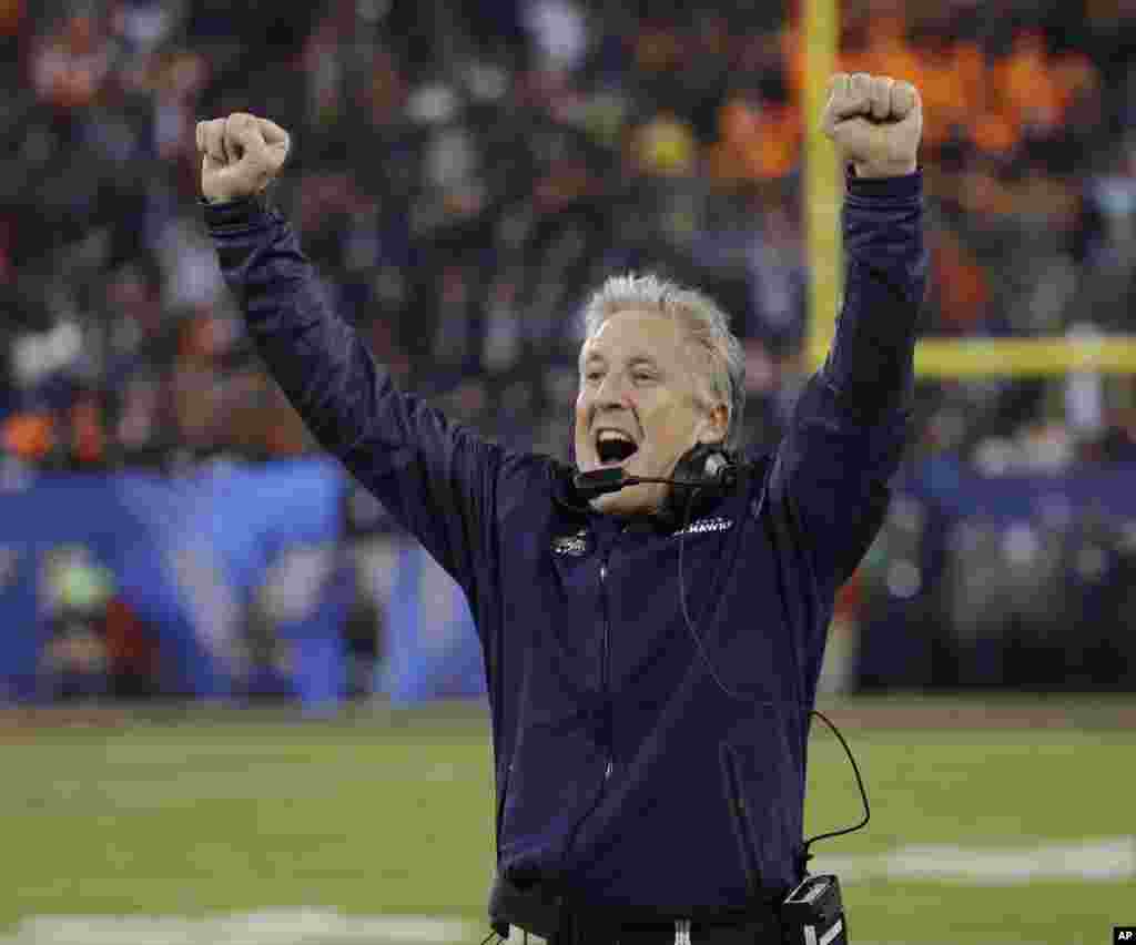 Seattle Seahawks head coach Pete Carroll reacts as Percy Harvin returns a kickoff for a touchdown during the second half of the NFL Super Bowl XLVIII football game against the Denver Broncos Sunday, Feb. 2, 2014.