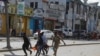 FILE - An injured civilian is evacuated from the scene of an explosion in Mogadishu, Somalia, Oct. 29, 2022. Al-Shabab claimed responsibility for the attack. In January 2023, the Somali government and the al-Shabab militant group each denied having peace talks.
