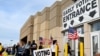Residents wait in line to cast their ballots for the 2022 midterm election at the Franklin County Board of Elections during early voting hours in Columbus, Ohio, Nov. 5, 2022. 