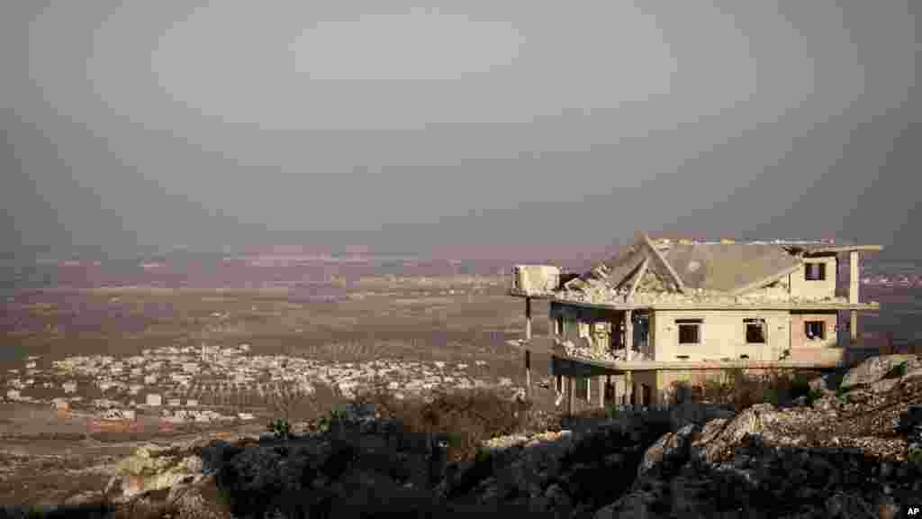 A destroyed building is seen in Telata village in Idlib province, Sept. 29, 2013.