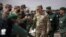 
On June 18, 2021, Gen. Stephen J. Townsend, head of the United States Africa Command, center, arrives alongside General Belkhir el-Farouk, Right, Moroccan Southern Zone Commander, to his right, to watch the African Lion military exercise.