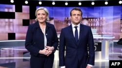 امانوئل مکرون و مارین لوپن فرانسوی دو نامزد ریاست جمهوری فرانسه  در دور دوم انتخابات ریاست جمهوری