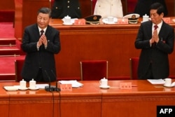 2022年10月22日，在北京人民大会堂举行的中共二十大闭幕式上，前中共总书记胡锦涛被离席后留下的空座位。