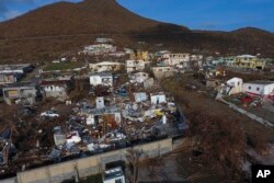 Sept. 11, 2017 photo shows storm damage in the aftermath of Hurricane Irma in the Cole Bay community of St. Martin.