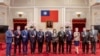 Taiwan President Tsai Ing-wen is pictured with six U.S. lawmakers and other U.S. delegation members at the presidential office in Taipei, Taiwan, in this handout picture released April 15, 2022.