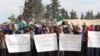Displaced Afrin Kurds protest Assad government's seige on Kurdish neighborhoods in Aleppo