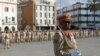 A Libyan Army commander leads a parade to celebrate the 75th anniversary of the establishment of the Libyan Army in Martyrs Square, Tripoli, Aug 13, 2015.