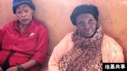 FILE - Cameroonian singer Anne-Marie Nzie (right)