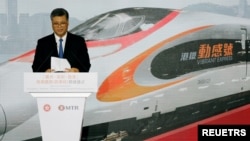 接替陈全国担任新疆自治区党委书记的马兴瑞2018年9月22日在广深港高铁香港段动工仪式上发表讲话。马兴瑞时任广东省长。