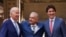 U.S. President Joe Biden, Mexican President Andres Manuel Lopez Obrador and Canadian Prime Minister Justin Trudeau pose at the conclusion of the North American Leaders' Summit in Mexico City, Mexico, Jan. 10, 2023. 
