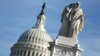 The figures of Grief and History stand atop the Peace Statue near the U.S. Capitol, Jan. 20, 2018. President Donald Trump and the U.S. Congress failed to reach a deal on funding federal agencies in Washington.