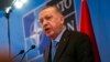 FILE - Turkish President Recep Tayyip Erdogan speaks during a media conference after a summit at NATO headquarters in Brussels, March 24, 2022. Turkey has condemned Russia’s aggression in Ukraine since the start of the invasion in February.
