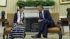 President Barack Obama meets with Aung San Suu Kyi in the Oval Office of the White House, Sept. 19, 2012.