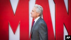 Michael Douglas poses for photographers upon arrival at the premiere of the film Ant Man in London, Wednesday, July 8, 2015. 