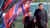 North Korean leader Kim Jong Un, right, and Choe Ryong Hae, vice-chairman of the central committee of the Workers' Party, arrive for the official opening of the Ryomyong residential area, in Pyongyang, North Korea, April 13, 2107. 