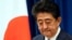 Japanese Prime Minister Shinzo Abe gestures during his press conference at the prime minister official residence in Tokyo on August 28, 2020. - Japan's Prime Minister Shinzo Abe announced on August 28, 2020 he will resign over health problems, in a…
