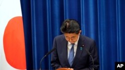 Japanese Prime Minister Shinzo Abe bows during a press conference at the prime minister official residence in Tokyo Friday, Aug. 28, 2020. Abe, Japan’s longest-serving prime minister, says he’s resigning because a chronic illness has resurfaced. …