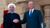 Rais wa Iraq Barham Salih, kulia akiwa na mgeni wake Rais wa Iran Hassan Rouhani