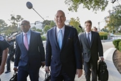 U.S. Ambassador to the European Union Gordon Sondland, center, arrives for a joint interview with the House Committee on Foreign Affairs, House Permanent Select Committee on Intelligence.