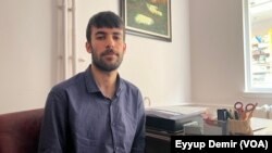 ئومیت بۆزان