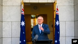 Le Premier ministre australien Scott Morrison lors d'une conférence de presse au Parlement à Canberra, en Australie, le 10 avril 2022.