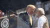 U.S. President Donald Trump and Indian Prime Minister Narendra Modi shake hands during a "Namaste Trump," event at Sardar Patel Gujarat Stadium, Monday, Feb. 24, 2020, in Ahmedabad, India.
