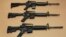 FILE -- Three variations of the AR-15 assault rifle are displayed in Sacramento, California.