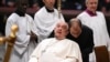 Pope presides over ceremony with wide bruise on his chin