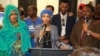 Ilhan Omar gives a victory speech after winning a key primary in Minneapolis with a goal of becoming the first Somali-American state legislator, Aug. 9, 2016. (M. Olad Hassan/VOA)