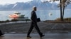 U.S. Secretary of State John Kerry walks to a meeting with Iranian Foreign Minister Mohammad Javad Zarif for a new round of nuclear negotiations Tuesday, March 3, 2015.
