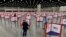 FILE - Voting stations are seen in the South Wing of the Kentucky Exposition Center in Louisville, Kentucky, June 23, 2020.