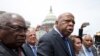 FILE - Rep. John Lewis, D-Ga., third from left, accompanied by fellow lawmakers, speaks on Capitol Hill in Washington , June 23, 2016.