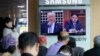 A TV screen shows images of U.S. President Donald Trump, left, and North Korean leader Kim Jong Un during a news program at the Seoul Railway Station in Seoul, South Korea, May 2, 2017.