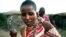A Maasai woman in her traditional village in northern Tanzania