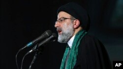 Iranian presidential candidate cleric Ebrahim Raisi speaks during his campaign rally for the May 19 election at Imam Khomeini grand mosque in Tehran, Iran, Tuesday, May 16, 2017. 
