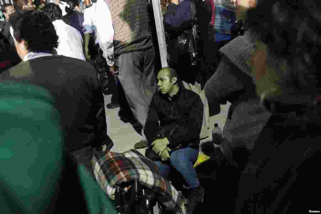 Relatives of Pemex's employees wait for information of their family members outside Pemex hospital in Azcapotzalco in Mexico City, January 31, 2013.