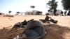 Students' shoes are left behind after gunmen abducted hundreds of boys at the Government Science School in Kankara, in northwestern Katsina state, Nigeria, Dec. 15, 2020.