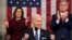 U.S. President Joe Biden delivers the State of the Union in the U.S. Capitol, Feb. 7, 2023, in Washington, as Vice President Kamala Harris and House Speaker Kevin McCarthy of California, applaud. In addition to moments of unity, several representatives heckled the president.
