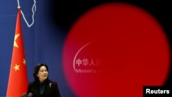 资料照：2022年2月24日，中国外交部发言人华春莹在北京举行的一个新闻发布会上（路透社）。