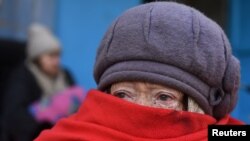 Жителька Маріуполя, 19 березня 2022, Reuters