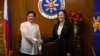 U.S. Vice President Kamala Harris, right, shakes hands with Philippine President Ferdinand Marcos Jr. at the Malacanang presidential palace in Manila, Philippines, Nov. 21, 2022.