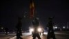 The U.S. military Honor Guard approaches a plane as an African delegation arrives at Joint Base Andrews in Maryland, Dec. 11, 2022, to attend the US-Africa Leaders Summit. 