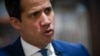 FILE - Venezuela's Juan Guaido speaks during an interview with The Associated Press, in Caracas, Dec. 9, 2020.